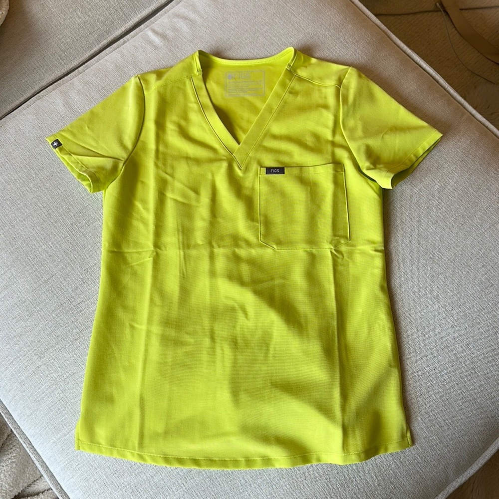 Figs yellow scrub top.